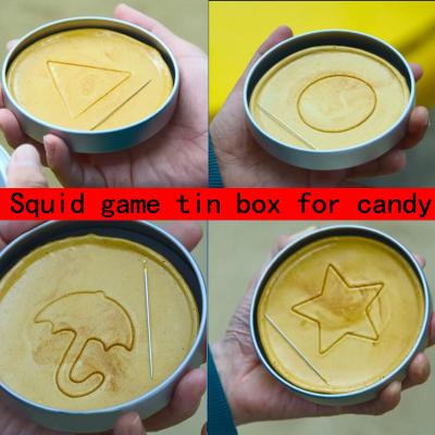 China Custom Round Tin Can Small Round Candy Box Matel Squid Playing Tin Boxes Factory Open Window Packaging Tin Can With Window For Candy for sale