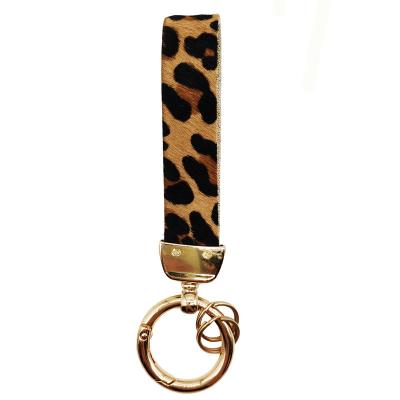 China Eco-Friendly / Fashionable Custom Cowhide Hair On Leather Key Holder Wrist Strap Lanyard Chain Key Chain for sale