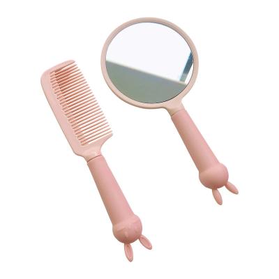 China Popular retro handle mirror travel cartoon rabbit creative cute hand-held cute comb set anti-static mirror comb for sale