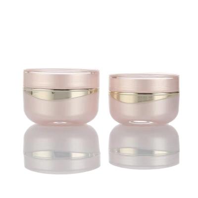 China 30G 1Oz Pink Cosmetic Plastic Jar With Lid Airless Round Cosmetic Jar Press Pump Acrylic Custom Cosmetics Jar for sale