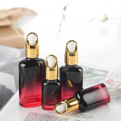 China Personal Care Around 30ml 10Ml 20Ml 50Ml 1 Ounce Glass Bottles Essential Oil Cosmetic Red Black Dropper Serum for sale