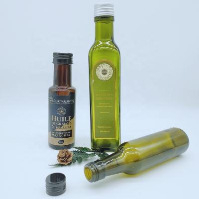 China Wholesale Eco-Friendly Custom Design Greem Black Olive Oil Bottle Liquor Glass Bottle With Metal Lid for sale