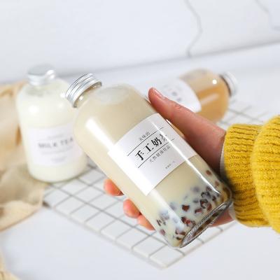 China New Products Eco - Friendly Empty Milk Tea Juice Wide - Neck Glass Bottles Bottles Straw Available for sale