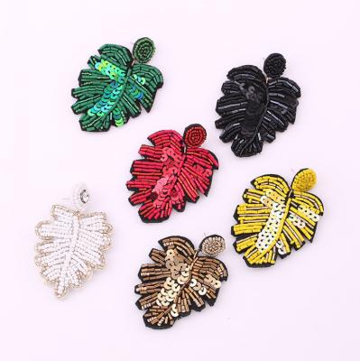 China Hot BOHEMIA Jewelry Handmade Beaded Leaf Boho Dangle Earrings For Women New Design Wedding Jewelry Resin Beads Drop To Dangle Earring for sale