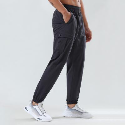 China Custom Drawstring Breathable Logo Cargo Gym Sport Casual Pants Black Gray Running Fitness Streetwear Hippop Sweatpants With Side Pocket for sale