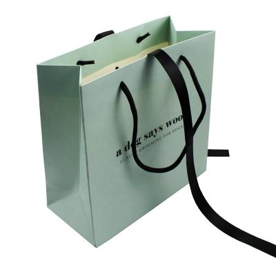 China Custom Luxury Golden Gift Bag Christmas Shopping Recyclable Personalized Paper Packaging Paper Bags for sale