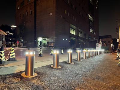 China Mitred Top Automatic Rising Bollards With LED Lights for sale