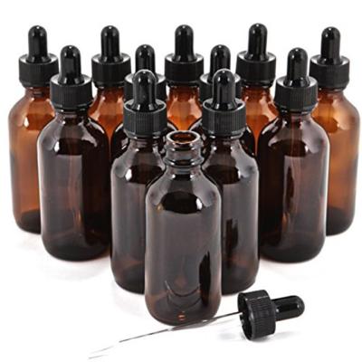 China Personal Care Low MOQ 60ml 2oz Glass Bottles With Glass Eye Droppers for sale