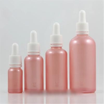 China DIN18 Personal Care Pink Neck 10ml 30ml 50ml 100ml Glass Pipettes Bottles With White Tamper Evident Glass Bottles for sale