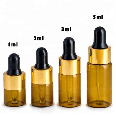 China Personal Care 1ml 2ml 3ml 5ml Amber Brown Glass Dropper Bottles Glass Vial With Silver Glass Pipettes for sale