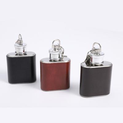 China Traditional Stainless Steel 1oz Hip Flask PU Leather Wrapped Mini Hip Flask for sale