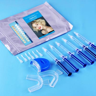 China Outstanding Whitening Effect Teeth Whitening Kit With 44%CP Light Led Whitening Gel Whitening System Dental Arch Trays For Oral Teeth Care Home Use for sale