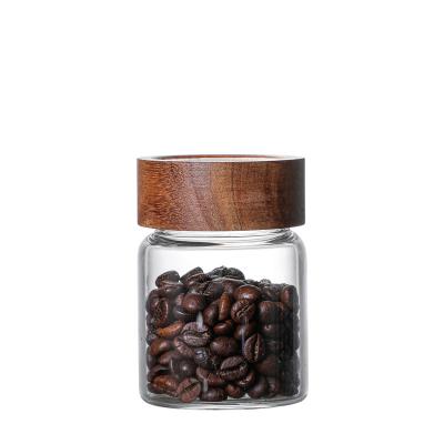 China Wholesale Minimalist Q Glass Storage Jars Wooden Lids Tea Coffee Bean Jar Cookies Flour Sugar Airtight Candy Spice Container for sale