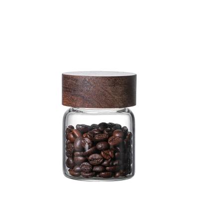 China Minimalist Q Reusable Glass Jars Seal Bottles Modern Food Storage Spice Jar With Wooden Lid for sale