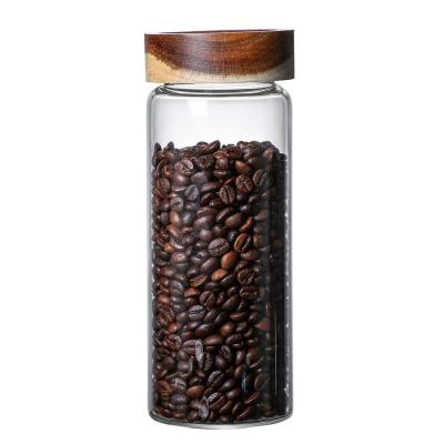 China Minimalist Q New Product Household Borosilicate Coffee Bean Nuts Storage Glass Jar With Wooden Cover for sale