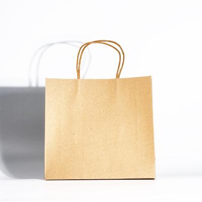 China Shoes & clothing custom printing brown Kraft paper packaging bag for sale