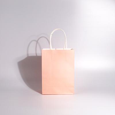 China Recyclable Wholesale Custom Thick  Plain Kraft Packing Handbag Paper Bags With Die Cut Handle for sale