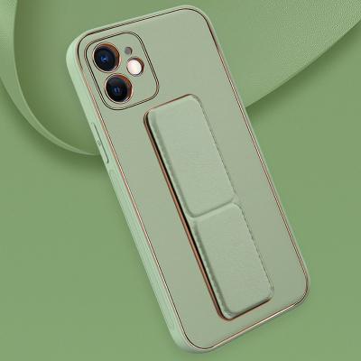 China Best Selling Amazon Kickstand Design Shockproof Phone Case Magnetic Car Holder Cell Phone Bag and Cases For IPhone Back Cover for sale