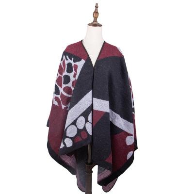 China 2022 European American New Design Knitted Irregular Pattern Poncho Winter Shawl For Women Bohemian Clothing for sale