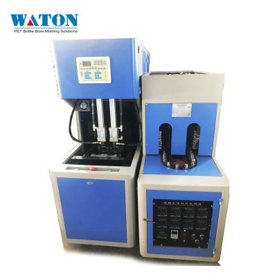 China Semi-automatic cheap plastic bottle blow molding machine good quality price 1000BPH PET bottle en venta