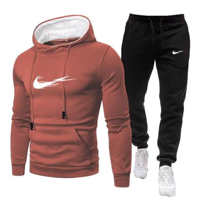 China Direct Wholesale Autumn And Winter Solid Color hooded sweater manufacturer men's fashion youth leisure tracksuit QUICK DRY set for sale