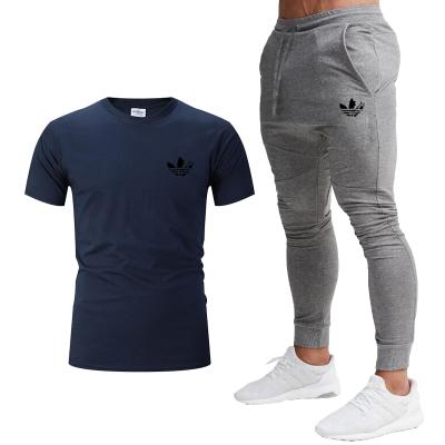 China 2021 QUICK DRY new fashion a set of men's casual short sleeve men's summer sports set of clothes for sale