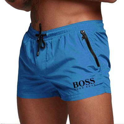 China Custom Anti-Wrinkle Mens Polyester Training Shorts With Pocket Gym Running Sport Fitness Bodybuilding Casual Men's Sandy Beach Shorts for sale