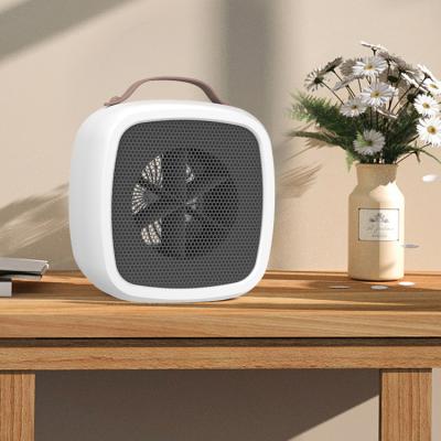 Chine Small household appliances mini AC 220V/11V electric PTC fan heater 500w desktop office home warm air blower à vendre