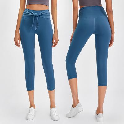 China 2021 Lulu New Front Waist Fashion Bandage Breathable Sports Cropped Pants Women Skin-friendly Diet Training Leggings Line Up Yoga Pants for sale