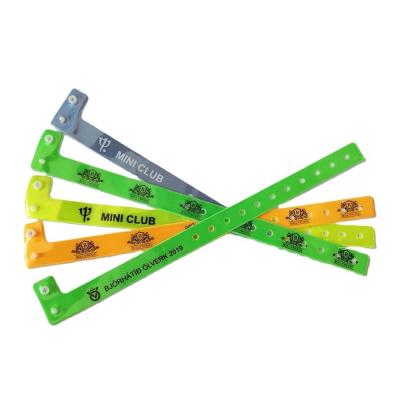 China Fluorescent Film PVC Material L Shape Wristband for Events 250*16mm Adjustable Size for sale