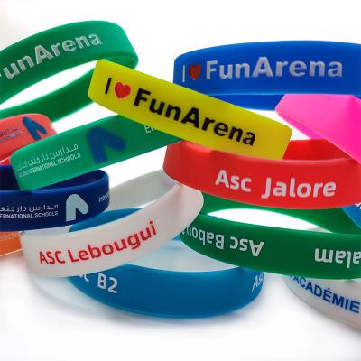 China 170*12*2mm Band Width Glowing in Dark Custom Silicon Wristband for Events Festival for sale