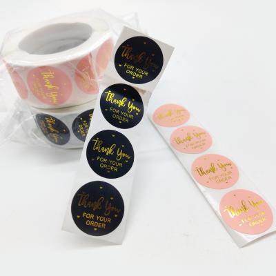 China 1 Inch Waterproof Kraft Paper Roll Gold Logo Label Stickers for Custom Order for sale