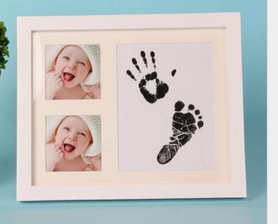 China Custom Cute Picture Frame Classic Newborn Footprint Baby Birth Mud Hand Keepsake Gift Photo Picture Frame for sale