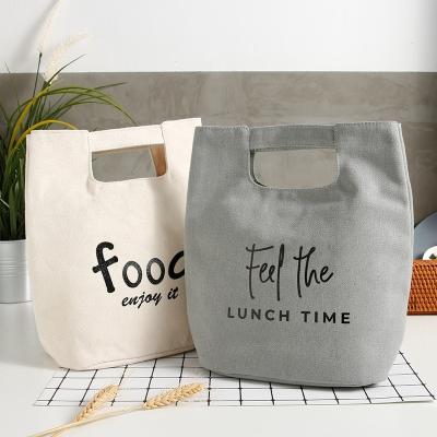 China 2020 Waterproof Hot Selling Thickened To Keep Cooler Lunch Tote Bag Canvas Cloth Bento Insulation Cooler Bag for sale