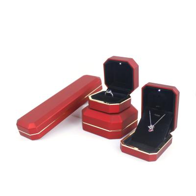 China Ring Box Pilou Shape Octagonal Jewelry Gift Box With Logo Led Light Luxury Jewelry Box With Lid for sale