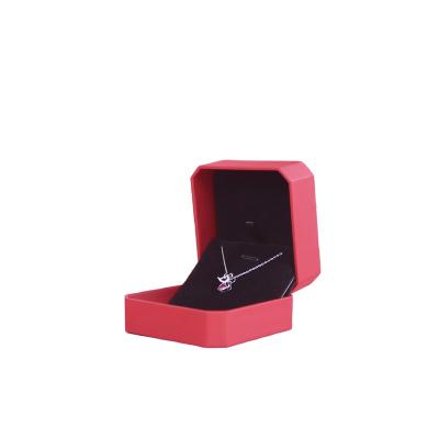 China Ring Box Design New For Embryo Plastic Rubber Leatheret Ring Jewelry Box Red Leather Octagon Velvet Jewelry Box for sale