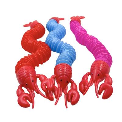 China 2022 New Design Anti Stress Dog Toy Spring Bending Decompression Busy Lobster Toy Animal Head Tube Expandable Sensory Sound Expandable for sale