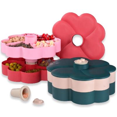 China Sustainable New Design Revolving Plastic Nut Dish Fruit Snack Storage Container Double Layer Flower Candy Boxes for sale