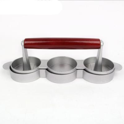 China Modern Premium Non-Stick Aluminum Triple-Slots Cute Burger Press for sale