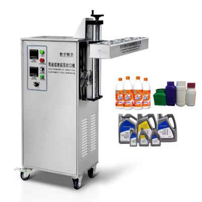 China Automatic Electromagnetic induction aluminum foil sealing machine à venda