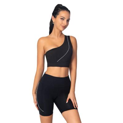 China Wholesale Custom Women Breathable One Shoulder Strap Workout Sports Bra 2 Piece Yoga Bra and Seamless Yoga Bike Shorts Set for sale