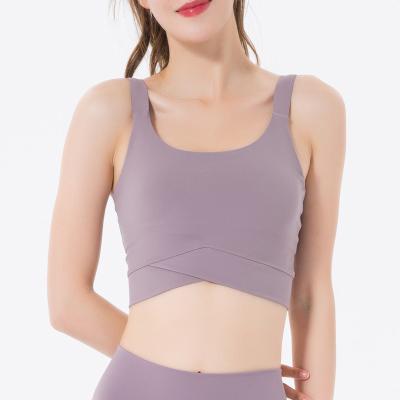 China Wholesale Breathable Gym Sporty Strappy Crop Workout Yoga Bra Workout Sports Bra Top Women Fitness Sportswear Women Yoga Bra for sale