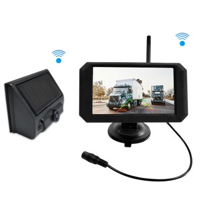 China Waterproof Solar Powered 2.4G Car Rear View Camera Wireless System Reversing Aid With 5inch Display for sale