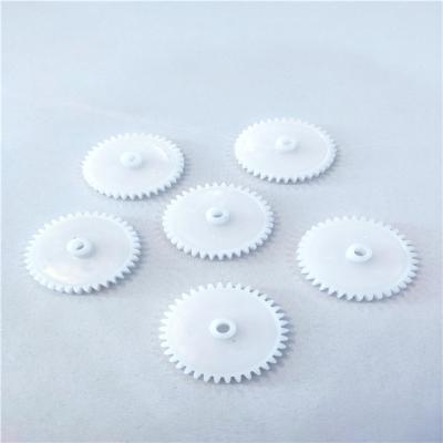 China Plastic Transmission Gearbox Parts POM Wear Resistant Plastic Gear Custom Clutch Gear for sale