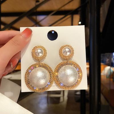 China New Trendy Vintage Gold Plated Metal Pearl Earrings Simple Fashion Earrings Trend 2021 for sale