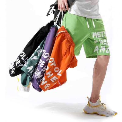 China Anti-wrinkle Summer 100% Polyester Print Hip Hop Cargo Shorts for sale