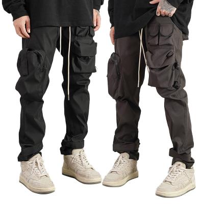 China Breathable Custom Multiple Pockets Streetwear Track Cargo Pants Men for sale