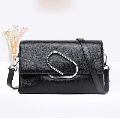 China 2023 fashion hot sale ladies lattice envelope cross body bag personality lock genuine leather shoulder bags for sale