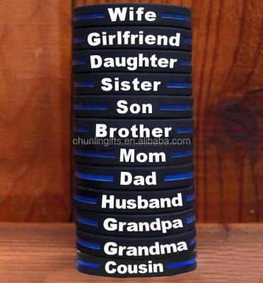 China Thin silicone bracelets from OEM Blue Line with different texts for sale