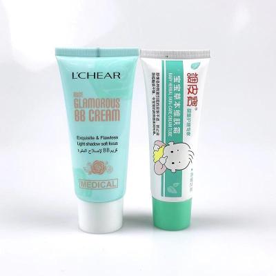 China Custom cosmetic factory skin care tube 30ml BB cream body lotion tube with green/white screw cover for cosmetics packaging PE tube for sale